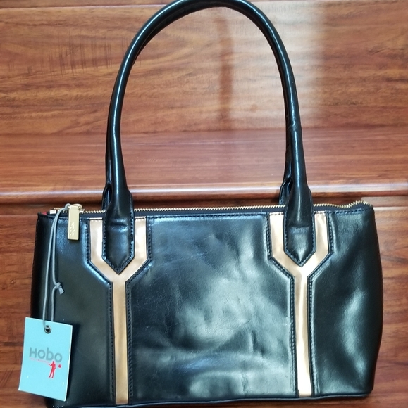 HOBO Handbags - HOBO The Original Black and Bronze 100% Leather